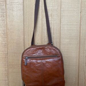 Jack George’s backpack/crossbody brown leather bag